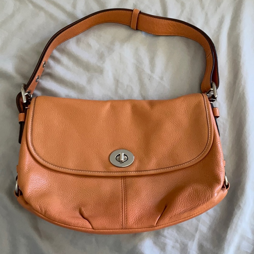 Salmon color coach handbag